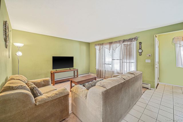 47 Holiday Boulevard, Center Moriches, NY 11934