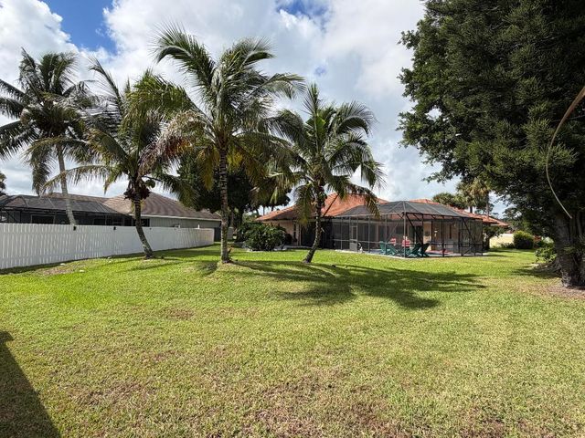 9050 Cypress Hollow Drive, Palm Beach Gardens, FL 33418