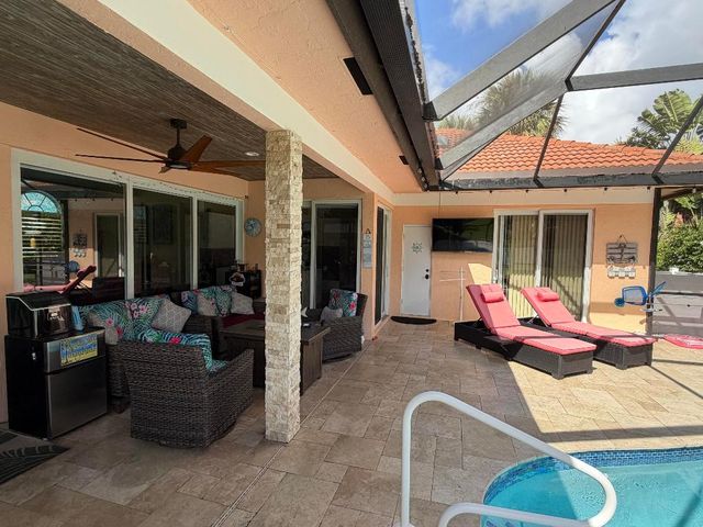 9050 Cypress Hollow Drive, Palm Beach Gardens, FL 33418