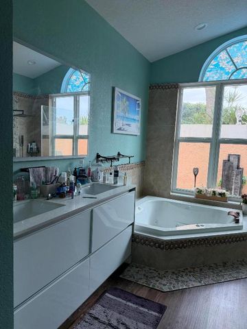 9050 Cypress Hollow Drive, Palm Beach Gardens, FL 33418