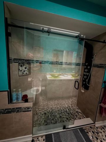 9050 Cypress Hollow Drive, Palm Beach Gardens, FL 33418