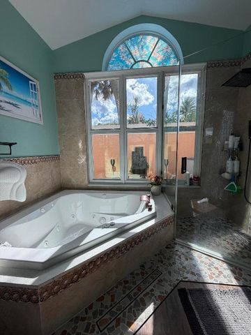 9050 Cypress Hollow Drive, Palm Beach Gardens, FL 33418