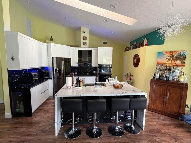 9050 Cypress Hollow Drive, Palm Beach Gardens, FL 33418