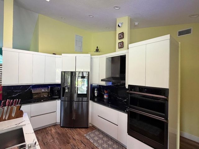 9050 Cypress Hollow Drive, Palm Beach Gardens, FL 33418