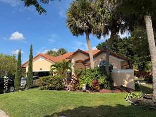 9050 Cypress Hollow Drive, Palm Beach Gardens, FL 33418