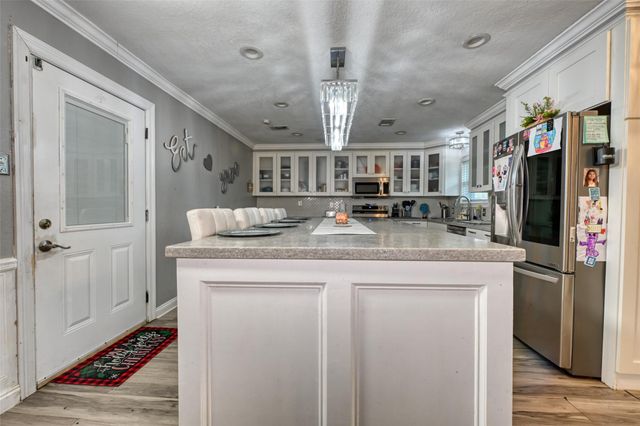 102 S Bow Drive, Jones Creek, TX 77541