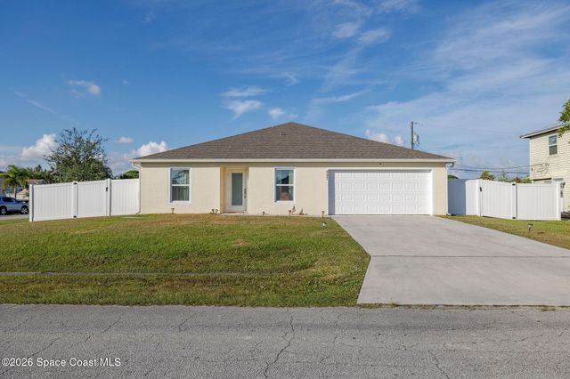 597 NW Kilpatrick Avenue, Port St. Lucie, FL 34983