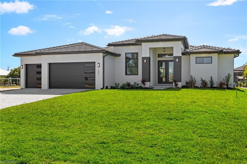 707 NW 38th AVE, CAPE CORAL, FL 33993 — exterior