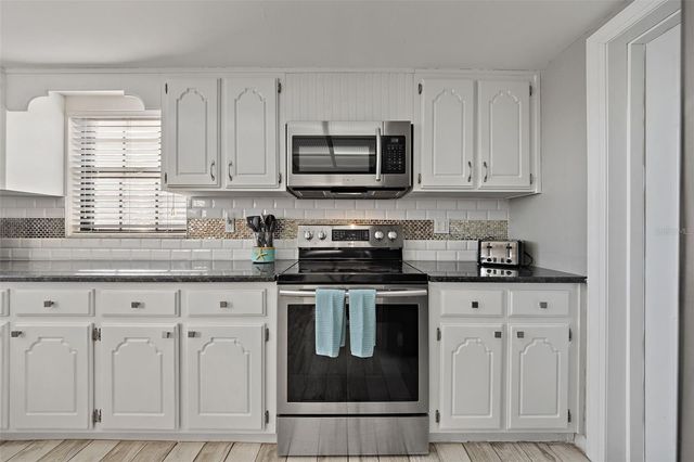 5702 RIDDLE ROAD, Holiday, FL 34690