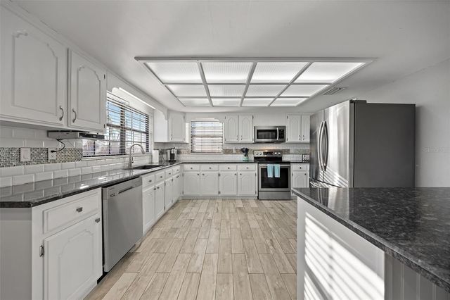 5702 RIDDLE ROAD, Holiday, FL 34690