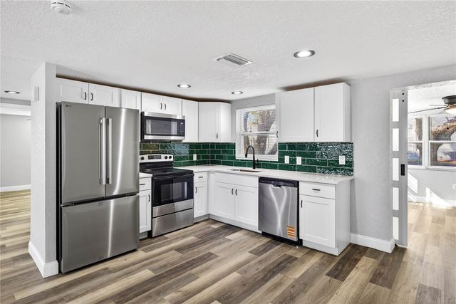 5647 ELKHORN BOULEVARD, Holiday, FL 34690