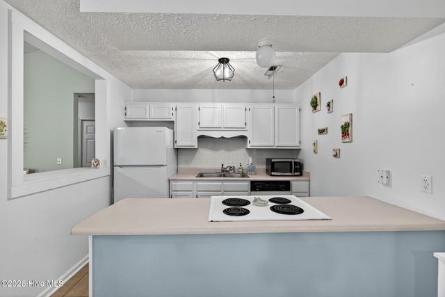 315 Tangle Oaks Court SE, Belville, NC 28451
