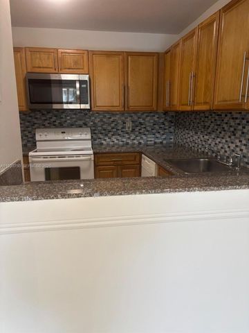 6930 Miami Gardens Dr 1-411, Hialeah, FL 33015