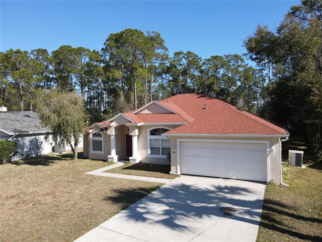 103 WOODSIDE DRIVE, Palm Coast, FL 32164