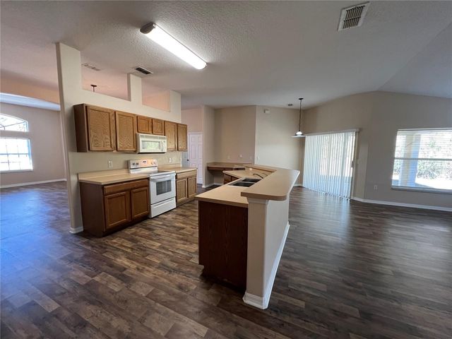 103 WOODSIDE DRIVE, Palm Coast, FL 32164