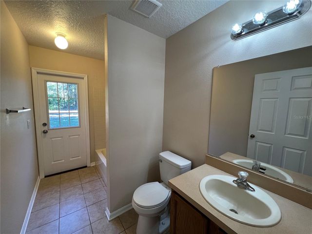 103 WOODSIDE DRIVE, Palm Coast, FL 32164