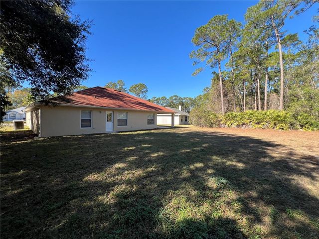 103 WOODSIDE DRIVE, Palm Coast, FL 32164