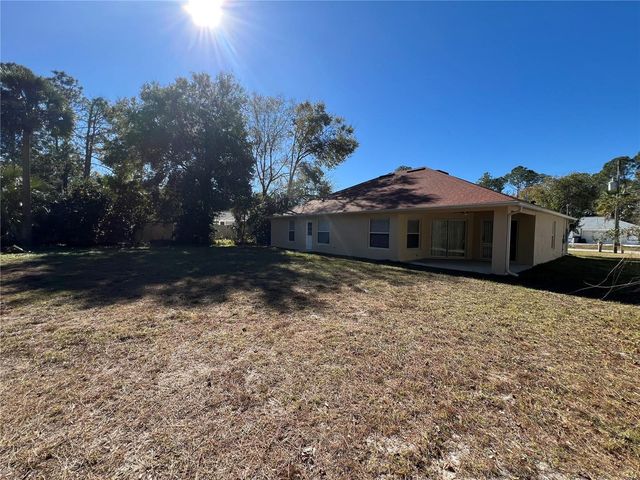 103 WOODSIDE DRIVE, Palm Coast, FL 32164