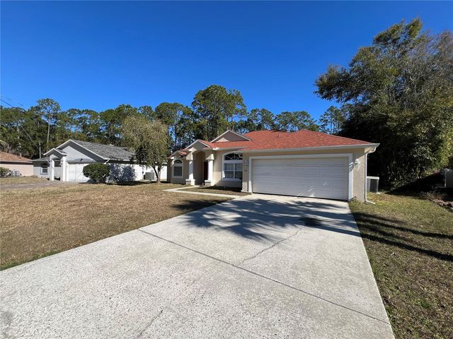 103 WOODSIDE DRIVE, Palm Coast, FL 32164