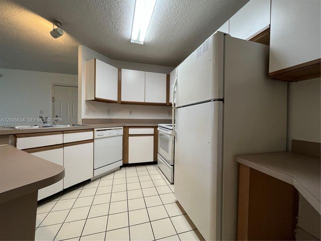 4035 W Mcnab Road F203, Pompano Beach, FL 33069