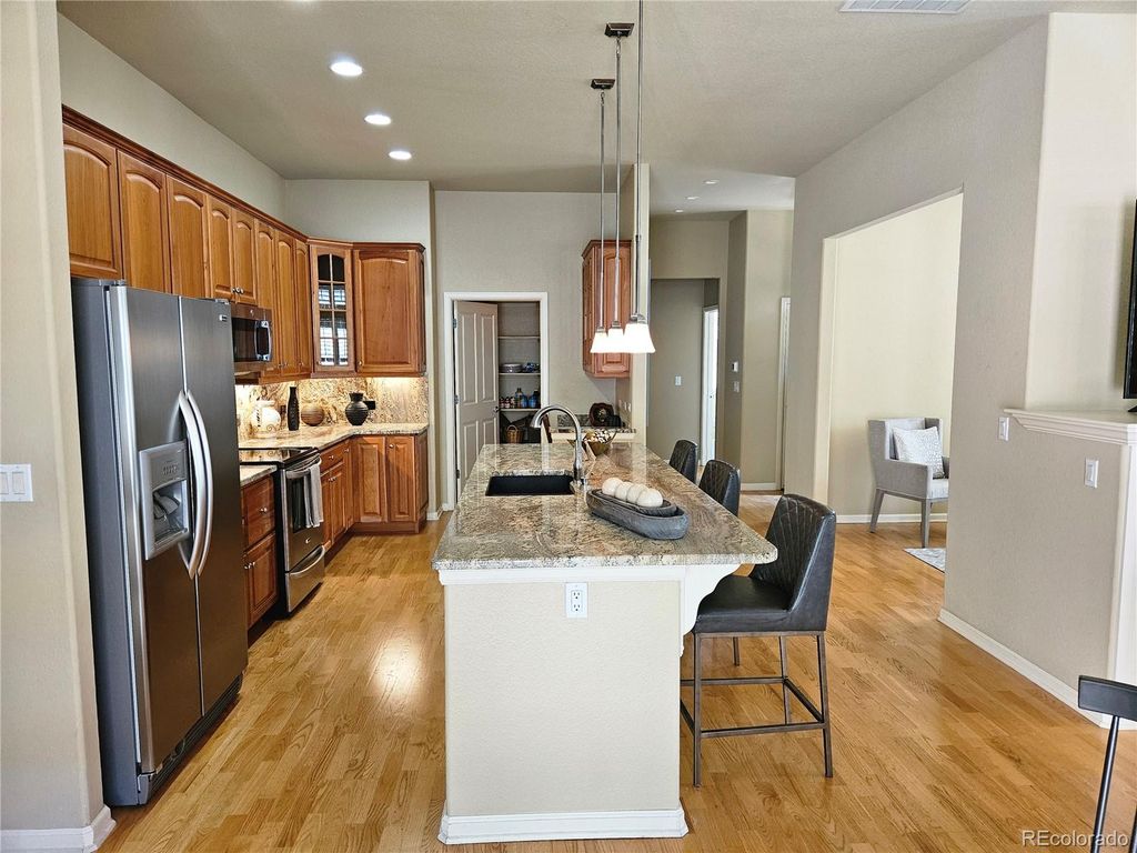 Image 7 of property listing at 9632 W Indore Drive, Littleton, CO 80128