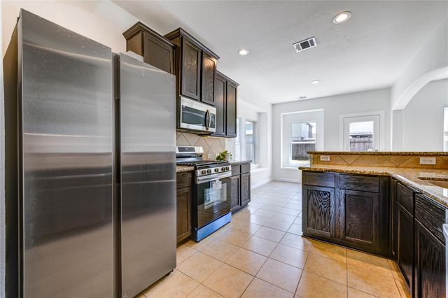 9918 Wood Wind Court, Baytown, TX 77521