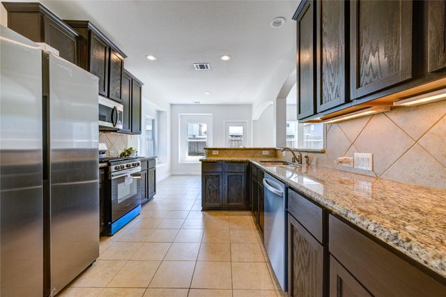 9918 Wood Wind Court, Baytown, TX 77521