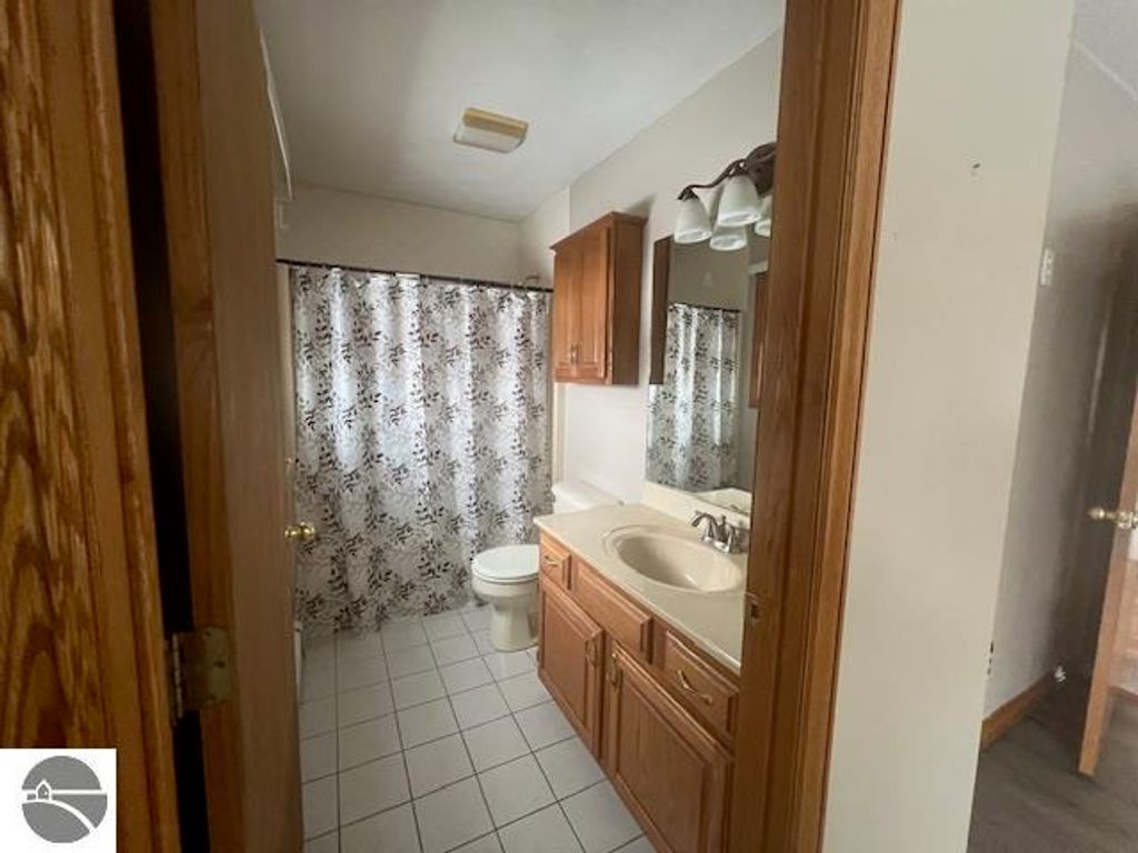 Image 20 of property listing at 7472 S Whispering Hills, Traverse City, MI 49684