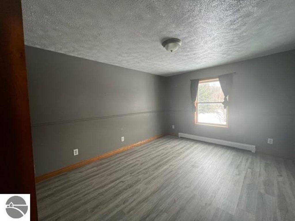 Image 23 of property listing at 7472 S Whispering Hills, Traverse City, MI 49684