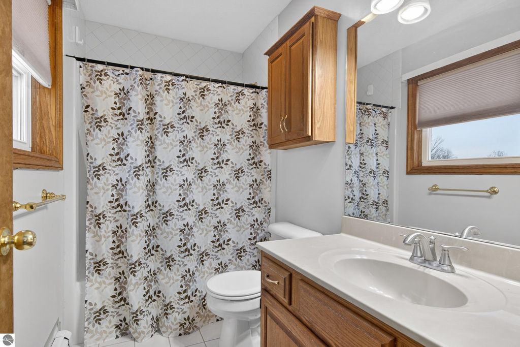 Image 27 of property listing at 7472 S Whispering Hills, Traverse City, MI 49684