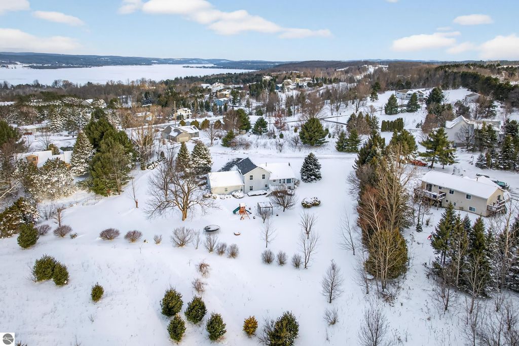 Image 3 of property listing at 7472 S Whispering Hills, Traverse City, MI 49684