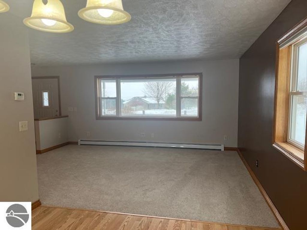 Image 5 of property listing at 7472 S Whispering Hills, Traverse City, MI 49684