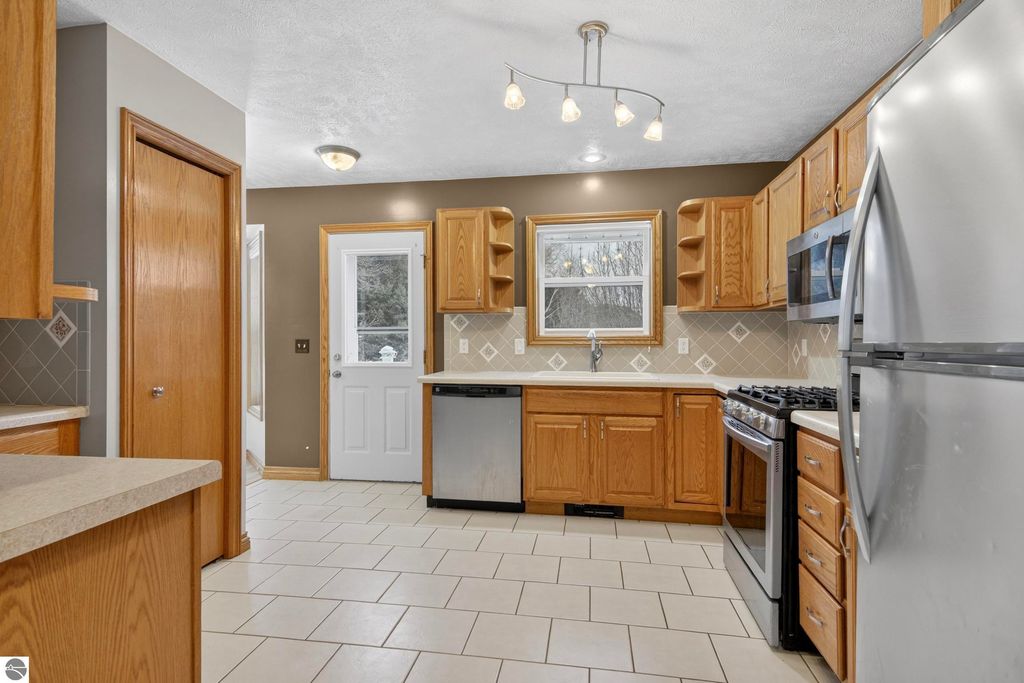 Image 9 of property listing at 7472 S Whispering Hills, Traverse City, MI 49684