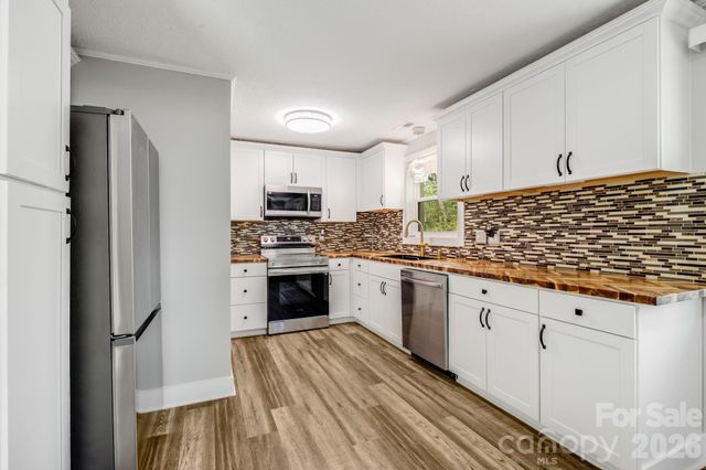 111 Sunset Hill Drive, Etowah, NC 28729