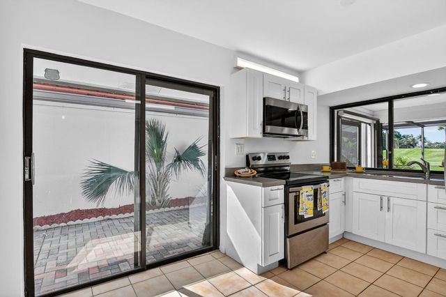 661 Deer Creek Hollows Circle, Deerfield Beach, FL 33442