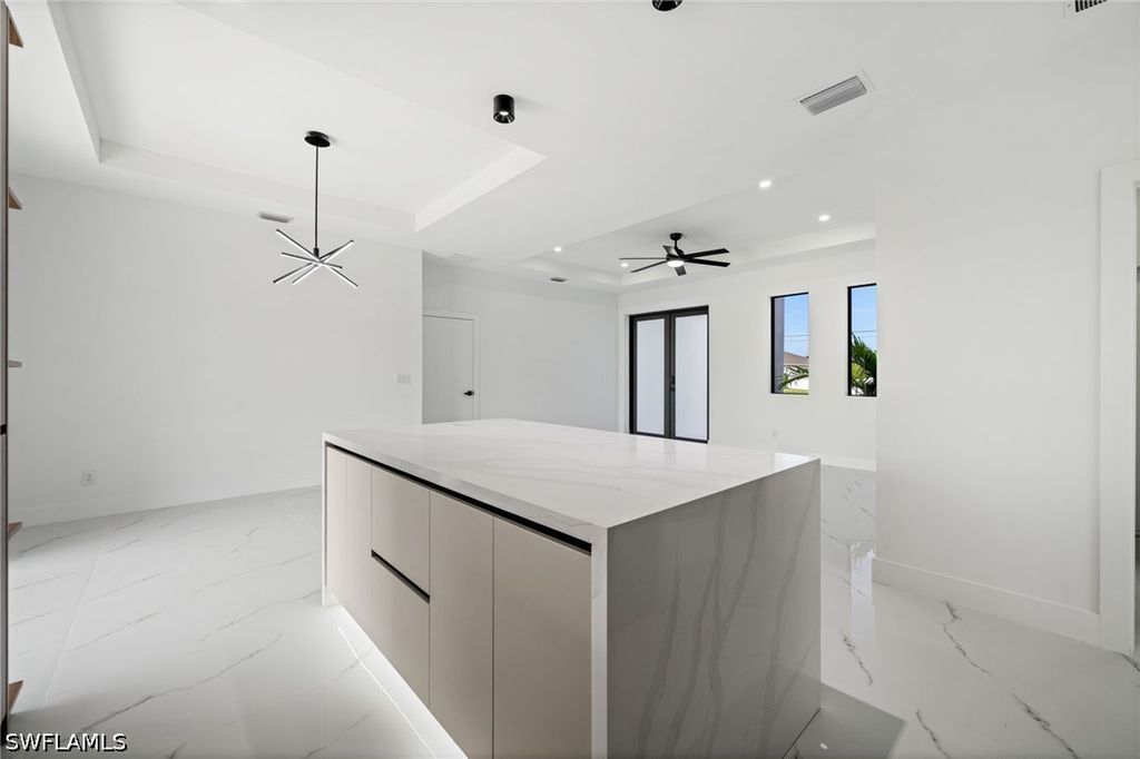 Image 12 of property listing at 409 NW 25TH PL, Cape Coral, FL 33993