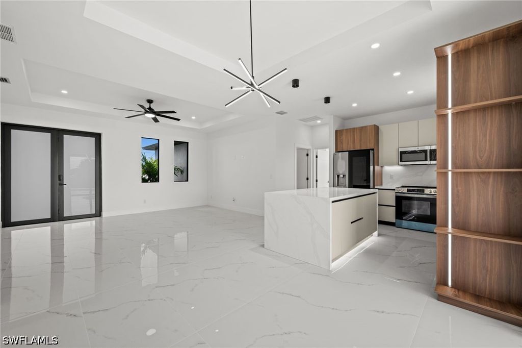 Image 13 of property listing at 409 NW 25TH PL, Cape Coral, FL 33993