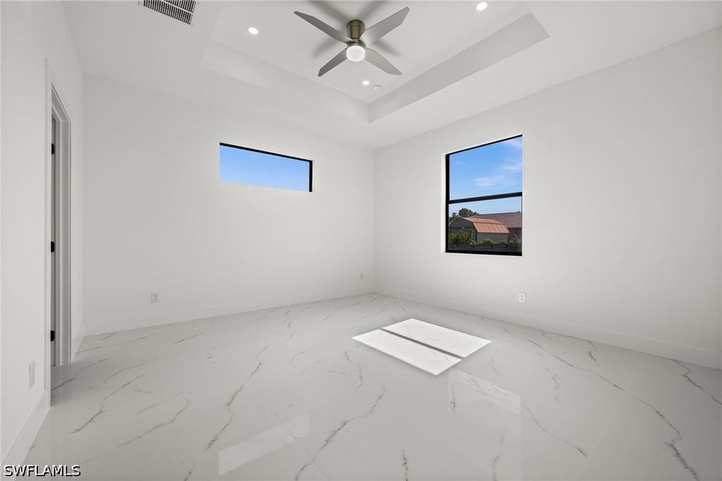 Image 18 of property listing at 409 NW 25TH PL, Cape Coral, FL 33993