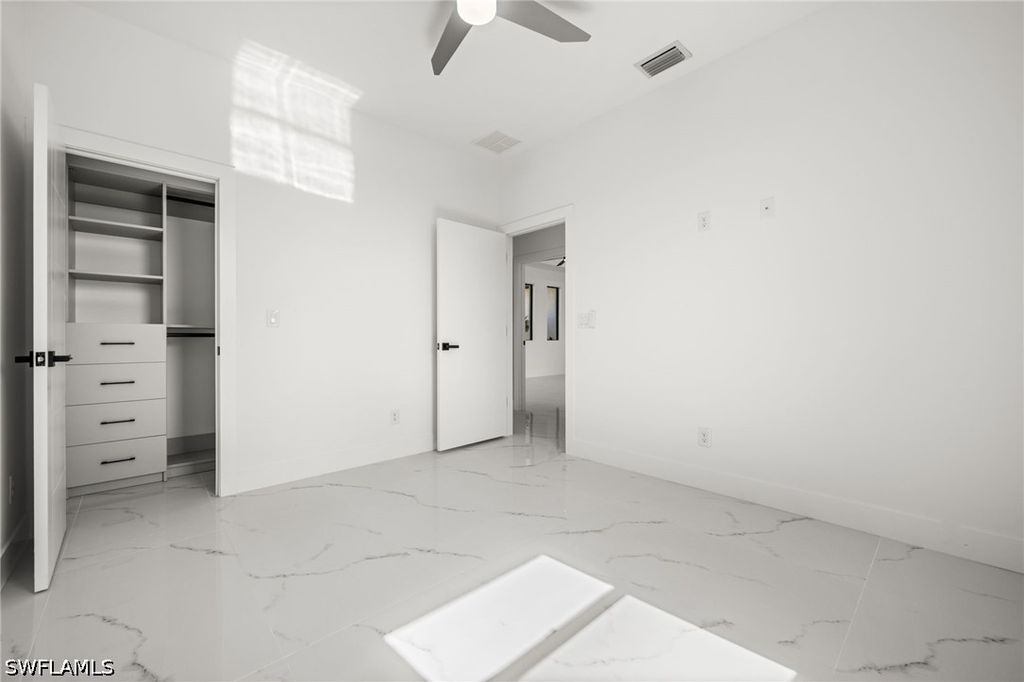 Image 26 of property listing at 409 NW 25TH PL, Cape Coral, FL 33993