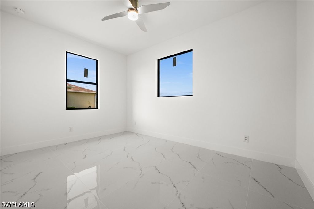 Image 28 of property listing at 409 NW 25TH PL, Cape Coral, FL 33993
