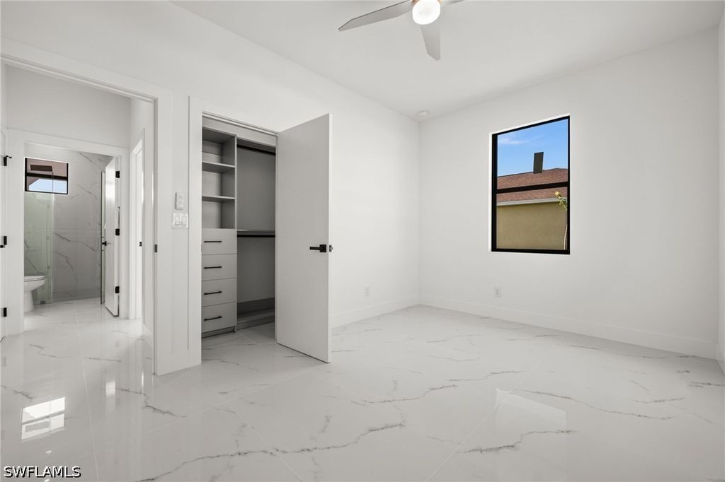Image 29 of property listing at 409 NW 25TH PL, Cape Coral, FL 33993