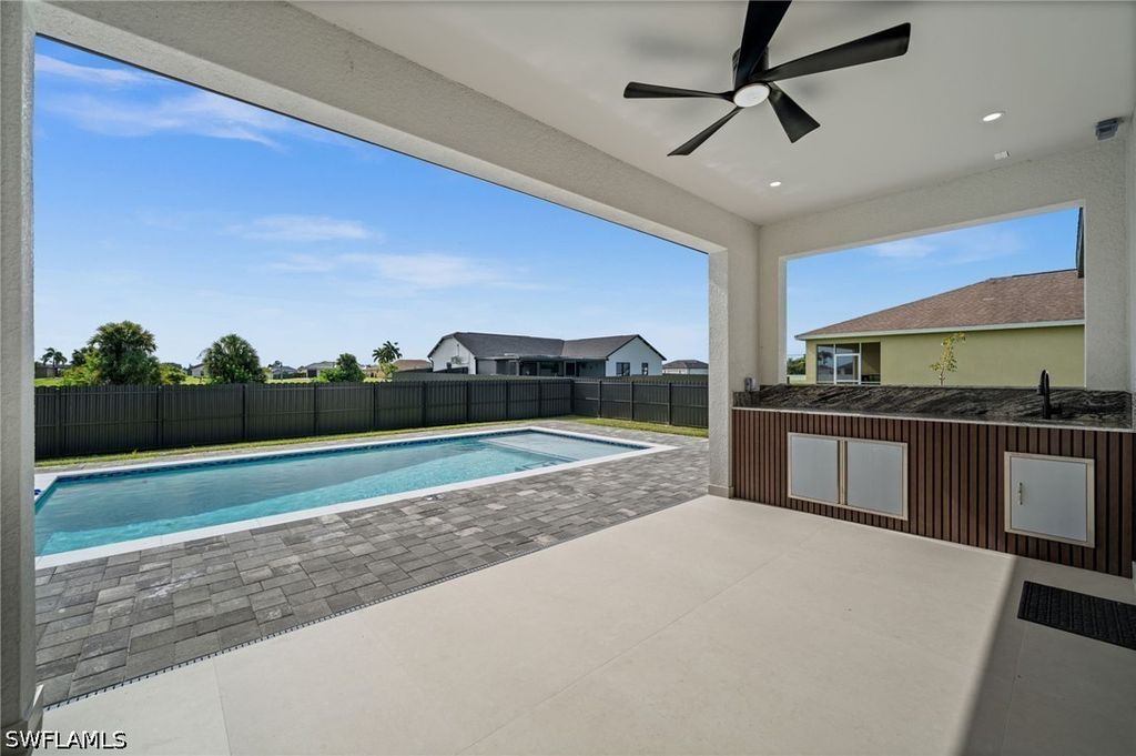 Image 32 of property listing at 409 NW 25TH PL, Cape Coral, FL 33993