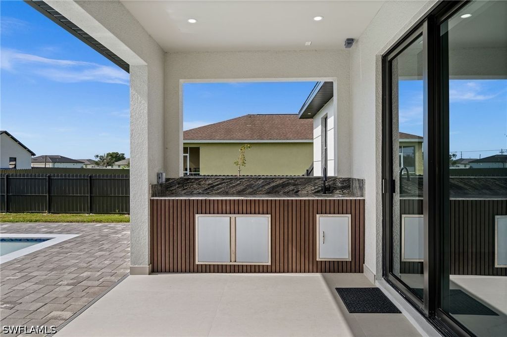 Image 33 of property listing at 409 NW 25TH PL, Cape Coral, FL 33993