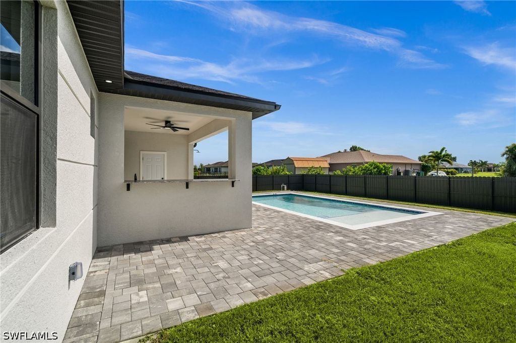 Image 36 of property listing at 409 NW 25TH PL, Cape Coral, FL 33993