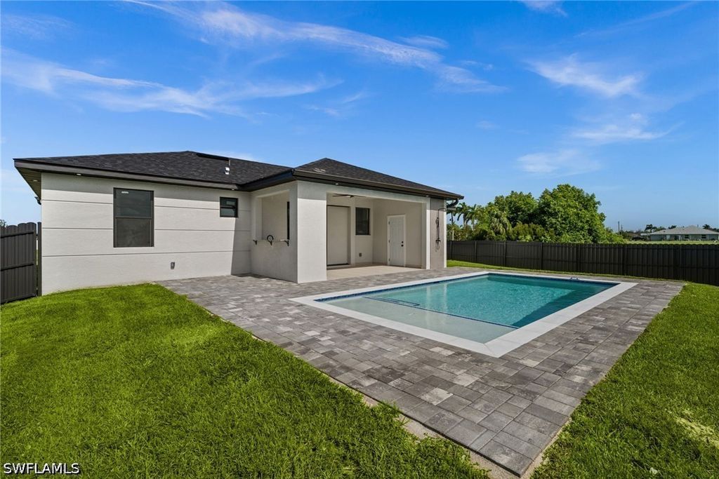 Image 37 of property listing at 409 NW 25TH PL, Cape Coral, FL 33993