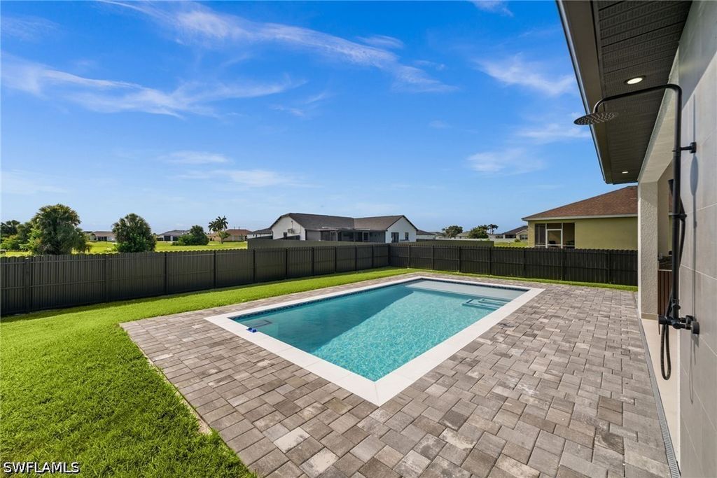 Image 38 of property listing at 409 NW 25TH PL, Cape Coral, FL 33993