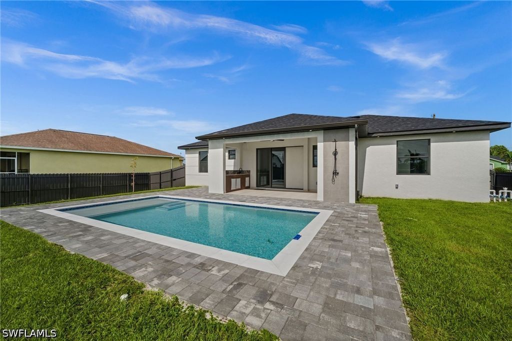 Image 39 of property listing at 409 NW 25TH PL, Cape Coral, FL 33993