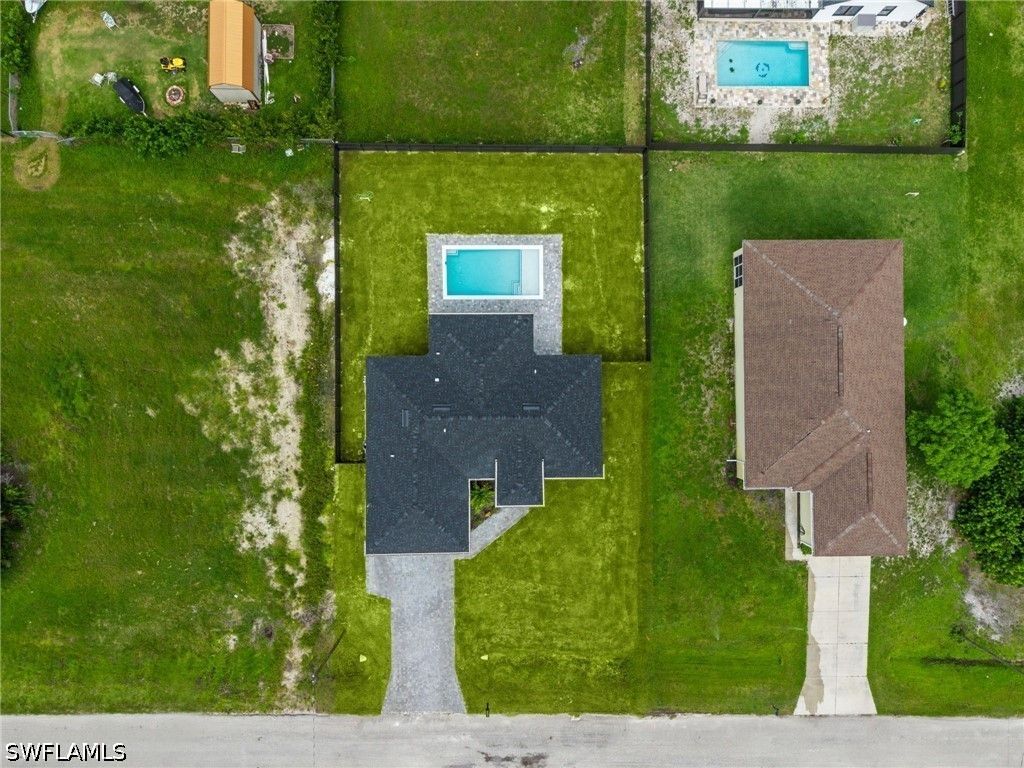 Image 4 of property listing at 409 NW 25TH PL, Cape Coral, FL 33993