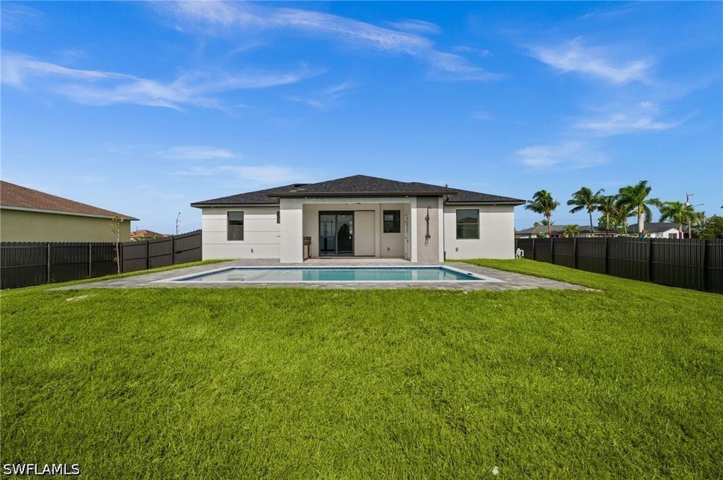 Image 40 of property listing at 409 NW 25TH PL, Cape Coral, FL 33993