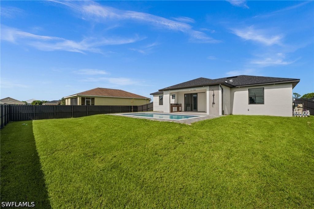 Image 41 of property listing at 409 NW 25TH PL, Cape Coral, FL 33993